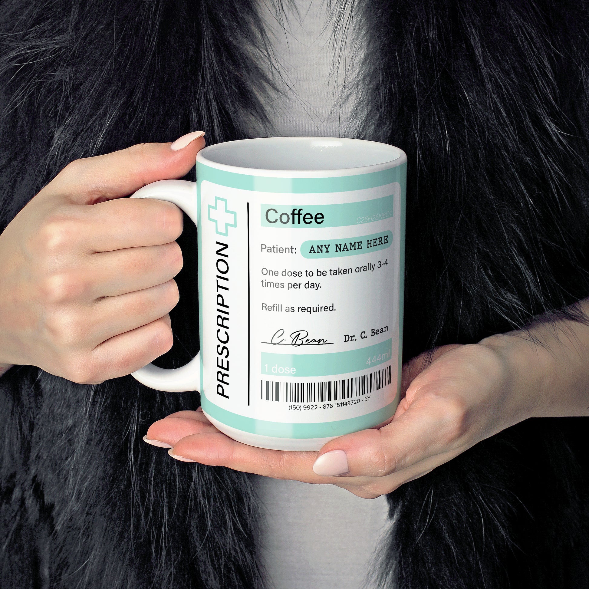 An image of a lady holding a 15oz ceramic mug